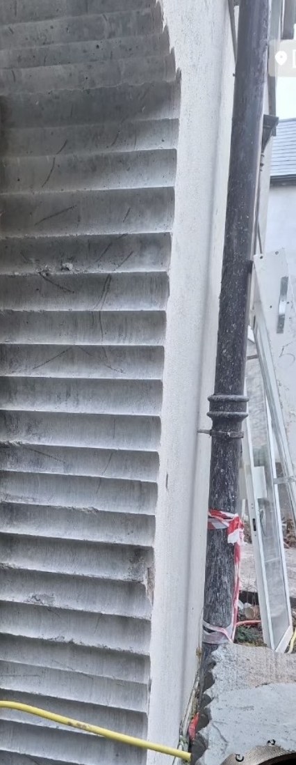 Stitch coring — large opening cut through exterior concrete wall, Doneraile