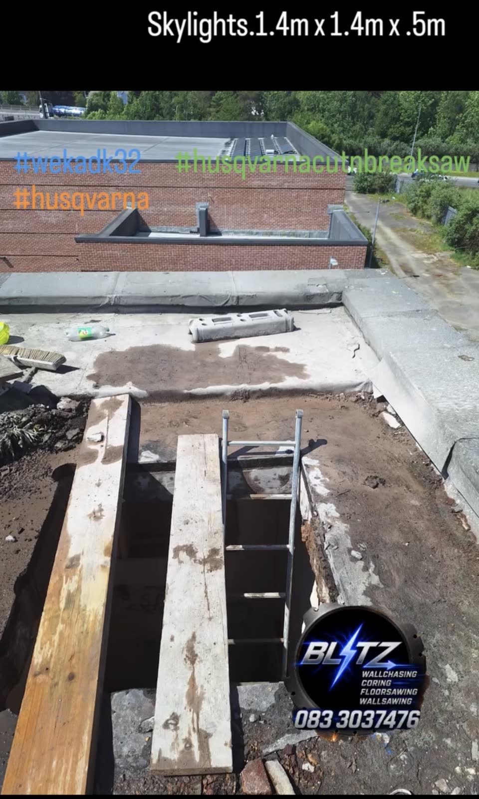 Second skylight opening being formed on flat commercial roof