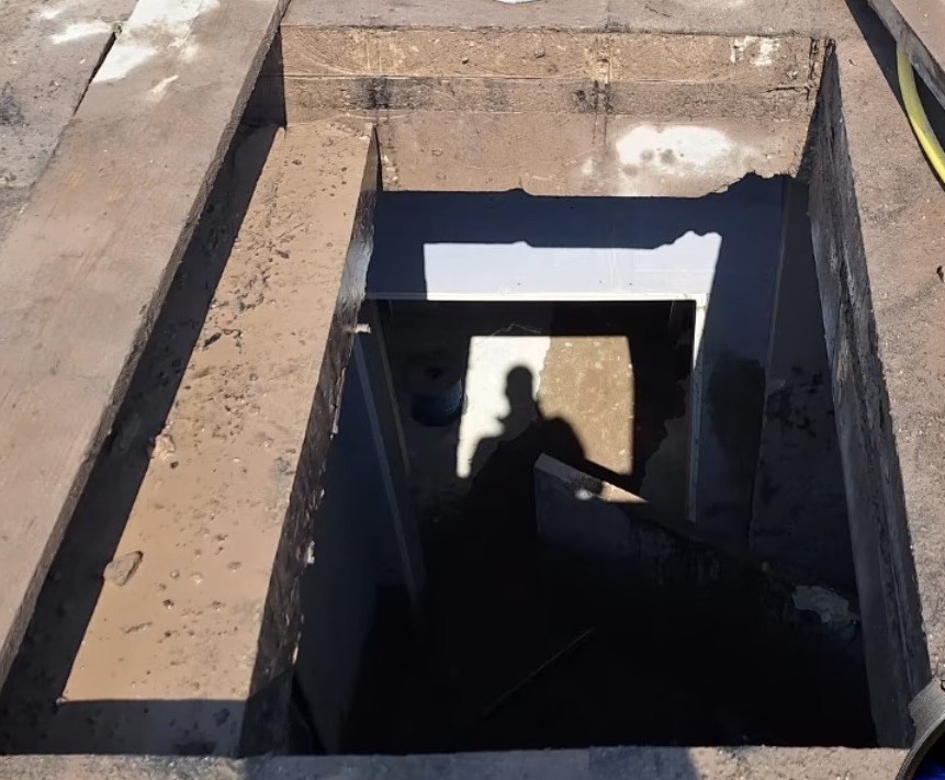 1.4m x 1.4m skylight opening cut through a flat reinforced concrete roof, Cork