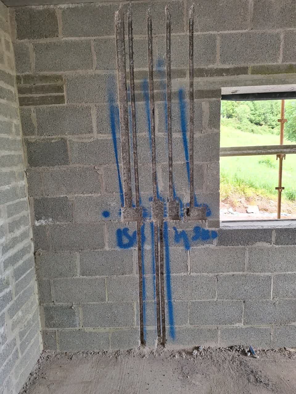 Multiple parallel wall chasing channels cut in blockwork — Munster